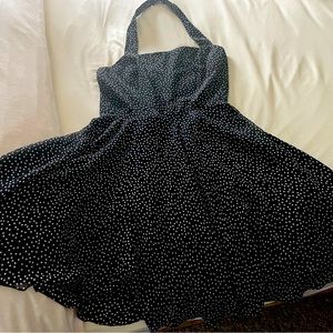 who doesn’t luv a polka dot sundress. A very sweet halter style -tons of pizazz!